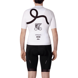 men from the back wearing a black and white cycling jersey