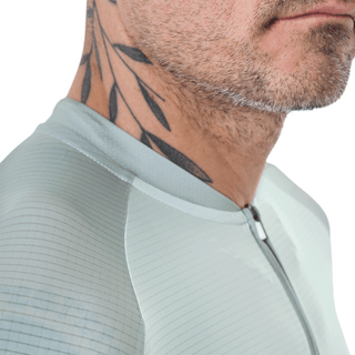 close up of a mint green cycling jersey