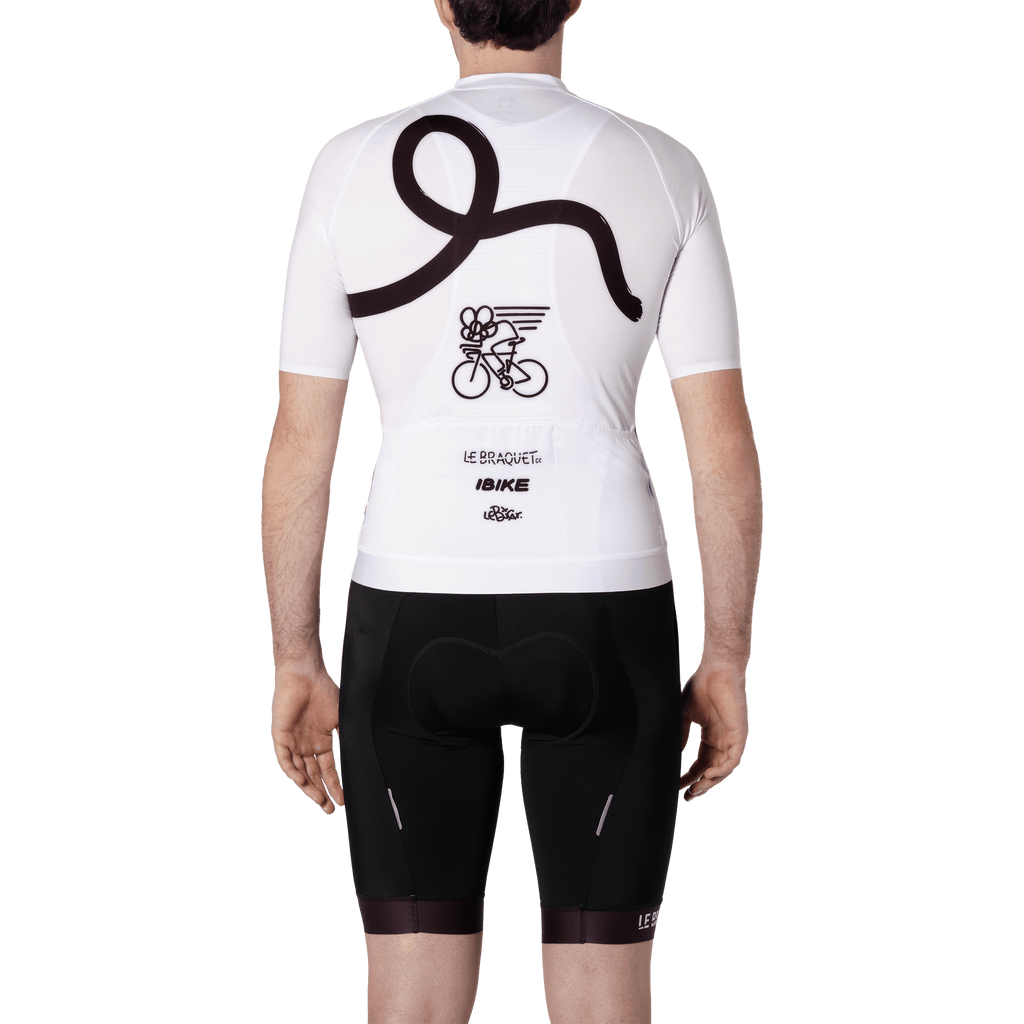 men from the back wearing a black and white cycling jersey 