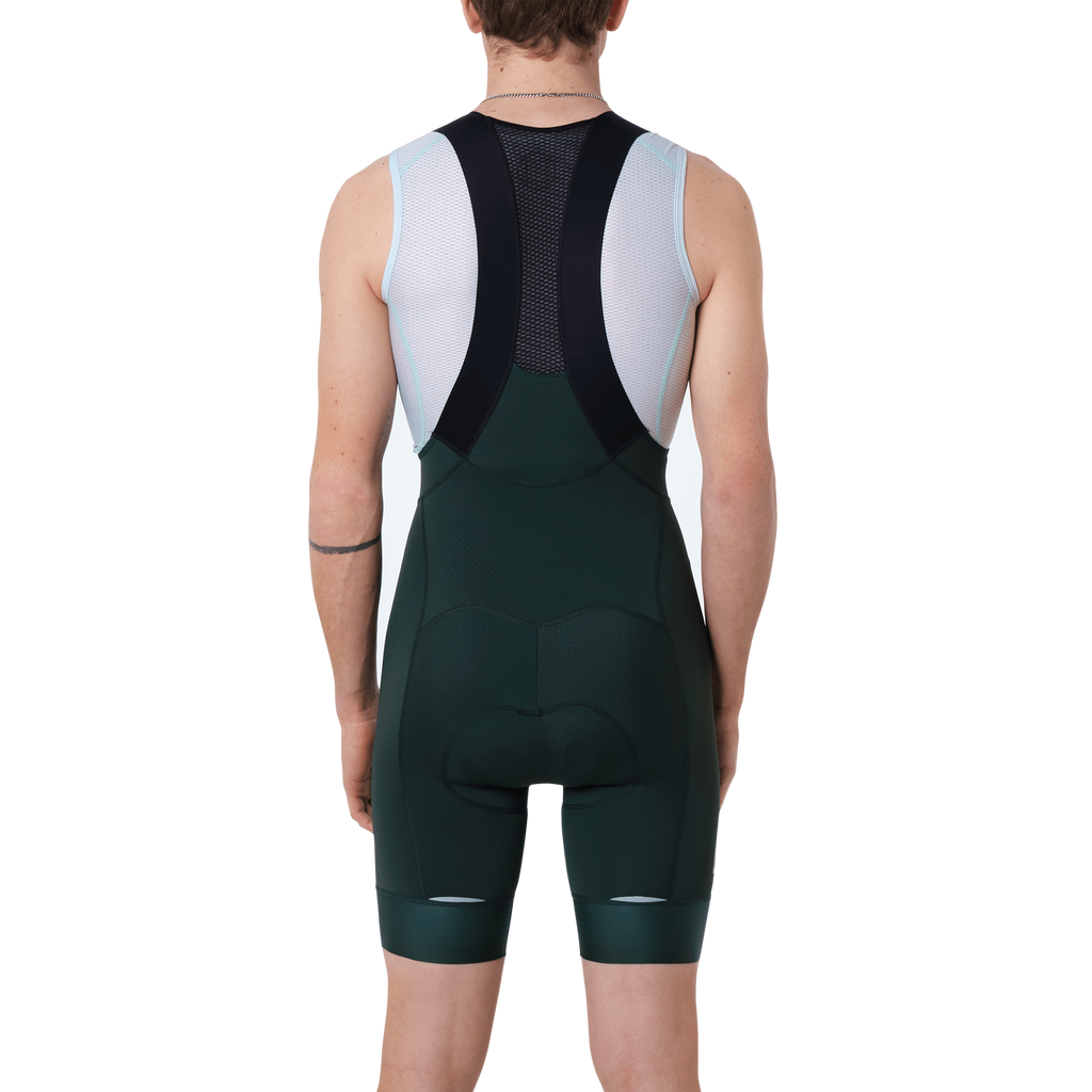 men from the back  wearing a forest green cycling short